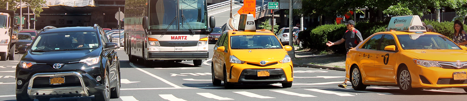 Taxi industry laws at work with taxis and transport on a NSW road